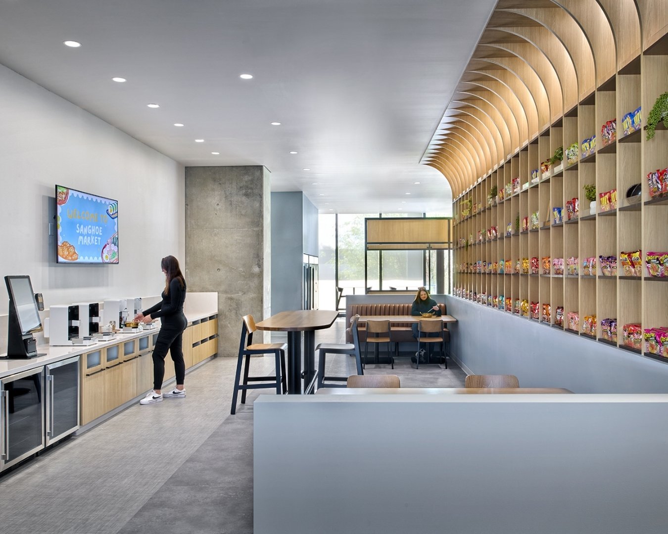 What was once an underutilized corner of campus is now a vibrant, culture-driven destination. Inspired by the company&rsquo;s origins as a small Korean trading shop, the Ramen Bar + Sanghoe Market reimagines the workplace amenity as both a social hub